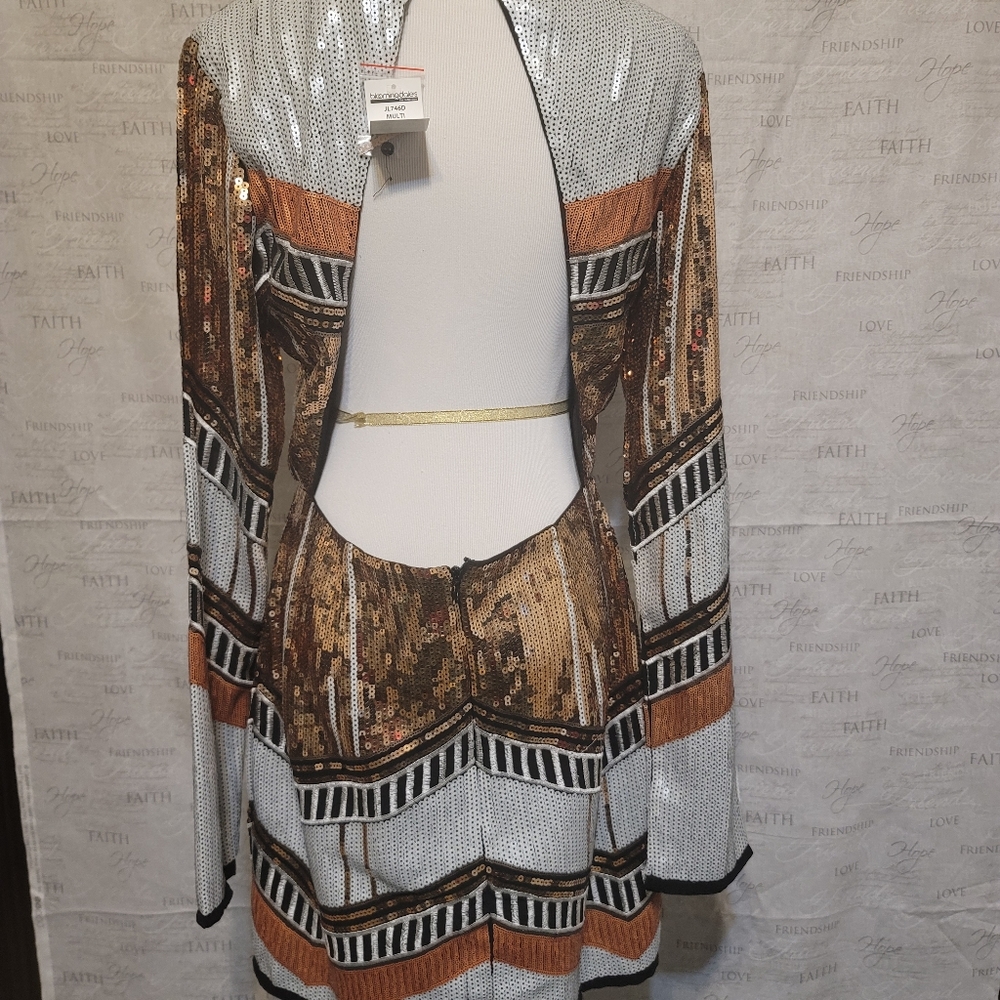 White, Black, and Gold Sequins long sleeve open back mid-length dress.